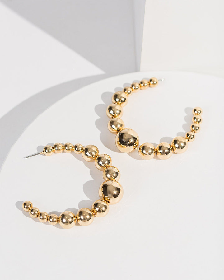 Colette by Colette Hayman Gold Chunky Beaded Hoop Earrings