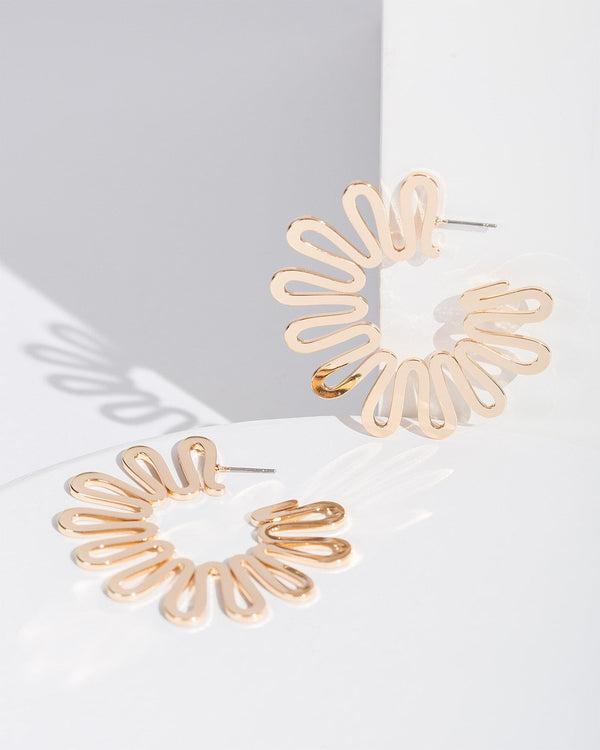 Colette by Colette Hayman Gold Swirled Round Statement Earrings