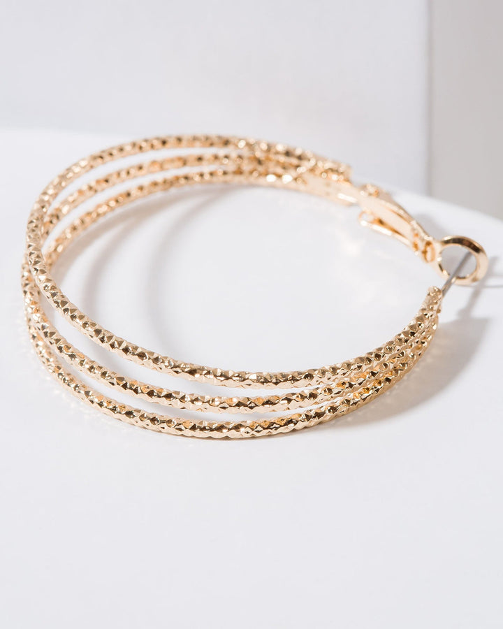 Colette by Colette Hayman Gold Textured Fine Triple Hoop Earrings