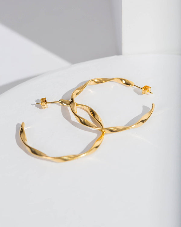 Colette by Colette Hayman Gold Wavy Hoop Earrings