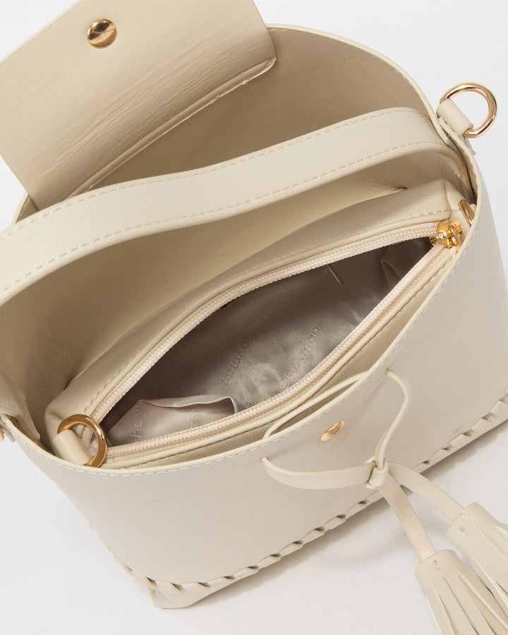 Colette by Colette Hayman Ivory Arielle Tassel Bucket Bag