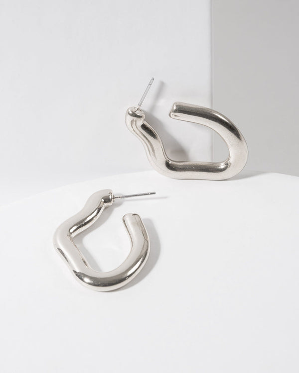Colette by Colette Hayman Silver Wavy Abstract Hoop Earrings