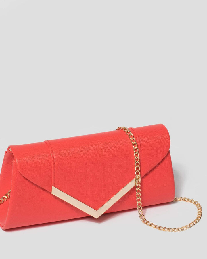 Coral Paula Arrow Clutch Bag | Clutch Bags