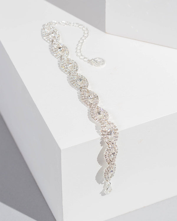 Colette by Colette Hayman Crystal Cross Ovearrings Bracelet