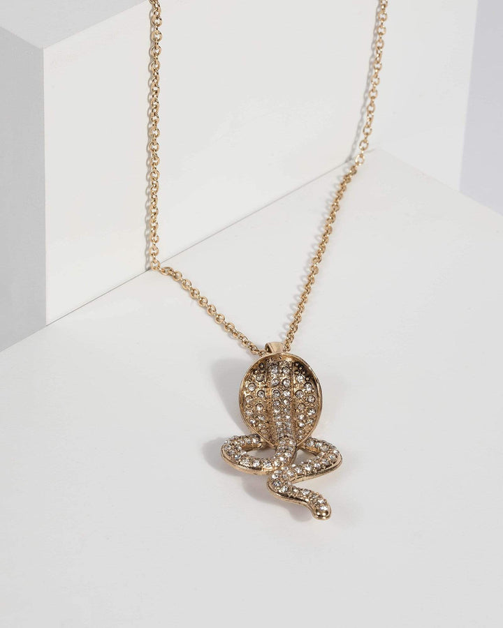 Gold Crystal Snake Pendant Necklace | Earrings