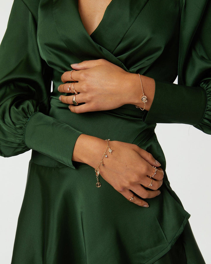 Gold Multi Star Charm Bracelet | Wristwear