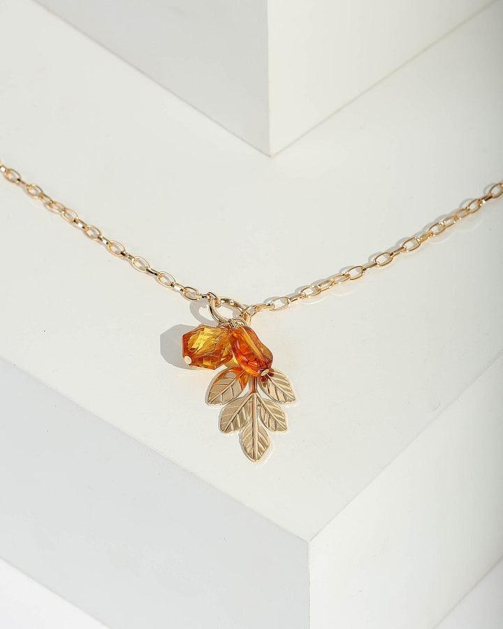 Gold Stone And Leaf Necklace | Necklaces