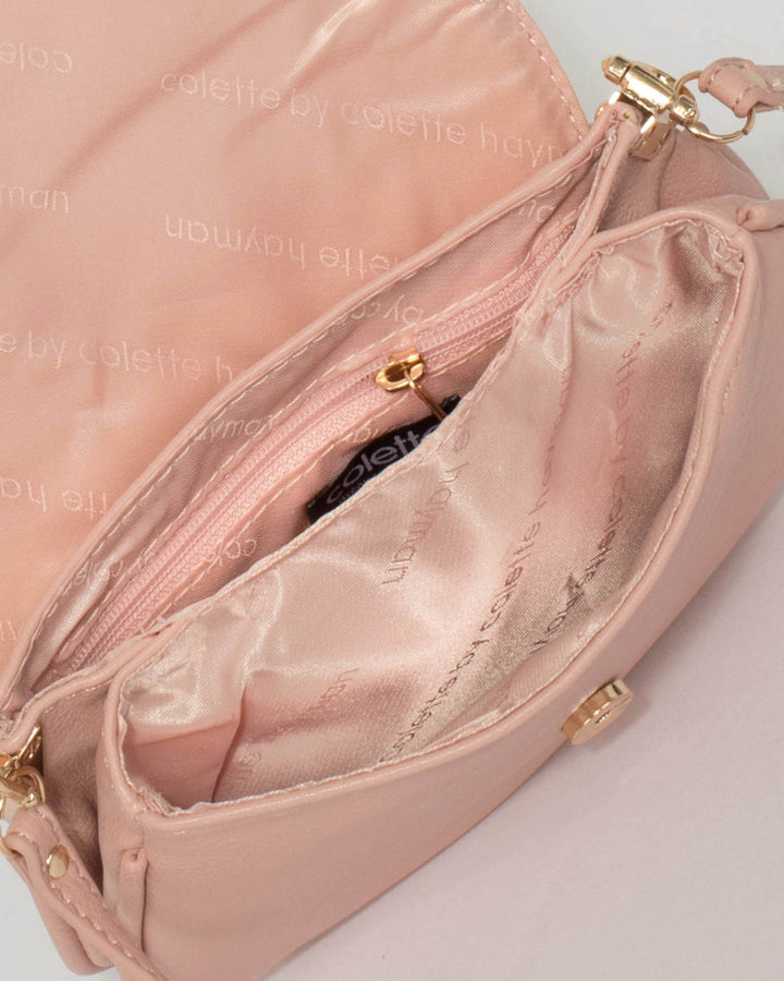 Pink Ellie Punchout Saddle Bag | Crossbody Bags