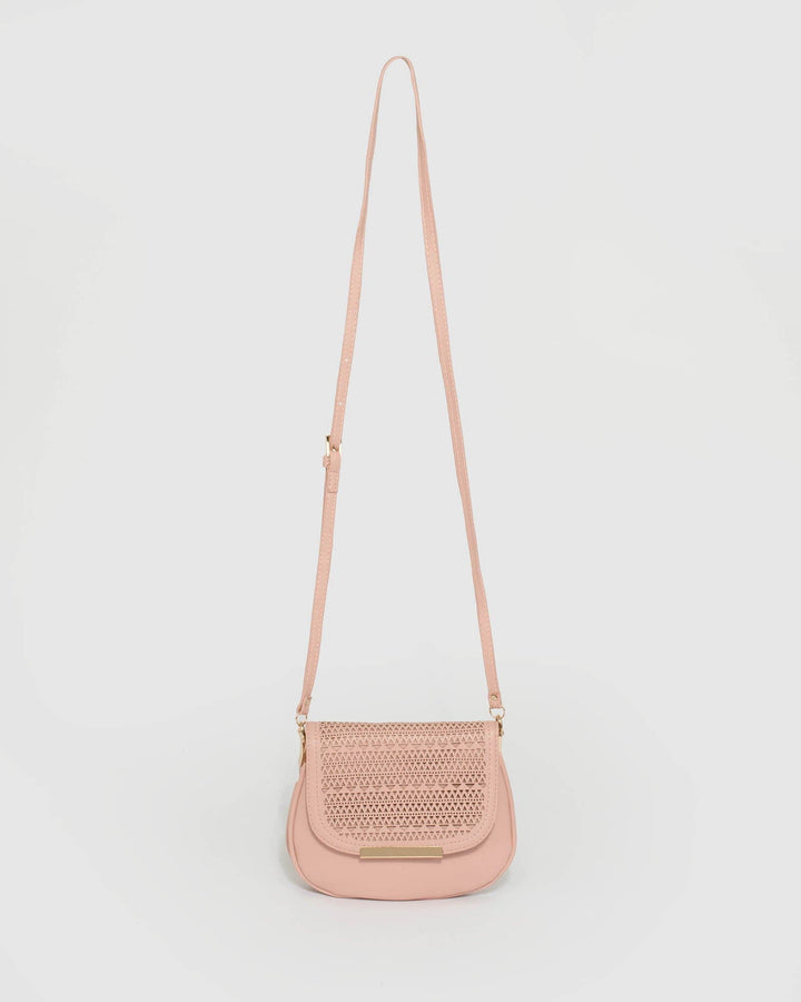 Pink Ellie Punchout Saddle Bag | Crossbody Bags